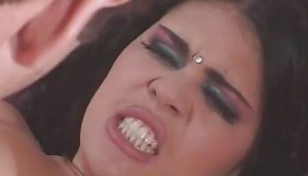 Sultry bosomy brunette savaged by long white cock on the couch