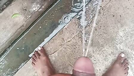 Indian cute boy showing his big cock and pissing