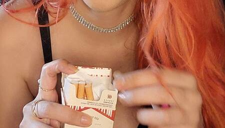 Slut redhead smoking cork in hot black lingerie - red lips