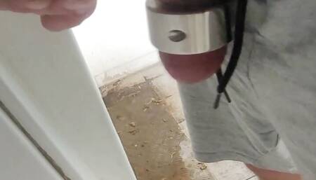 Big cock jerks off in public toilet