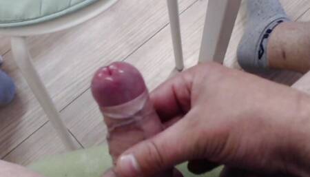 guy masturbates dick close-up