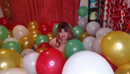 JOI surrounded by balloons