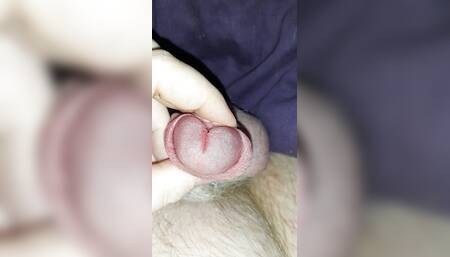 Close up precum and foreskin play