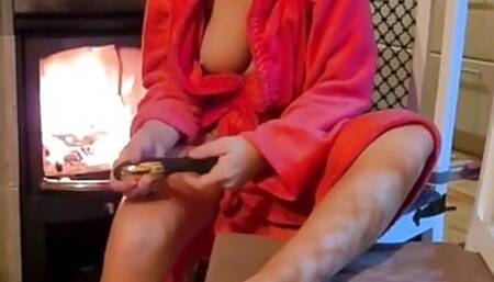 Cute MILF in Sauna in Front of the Fireplace with Her Vibrator