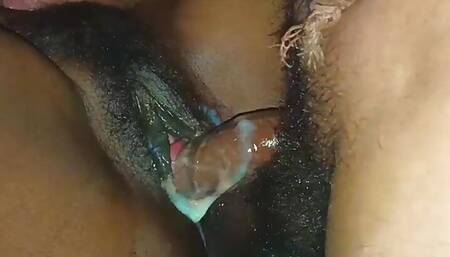 Fucking by spreading the vagina with both hands