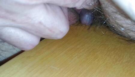 Rubbing the tip of my Penis on the table
