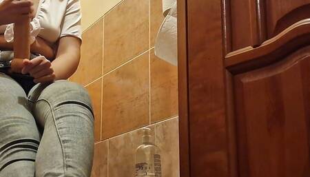 Mistress punishes slave with strapon in toilet