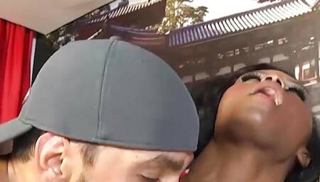 Busty black shemale with red high heels gets fucked bareback