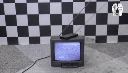 Working Tv under Christins Buffalo Boots