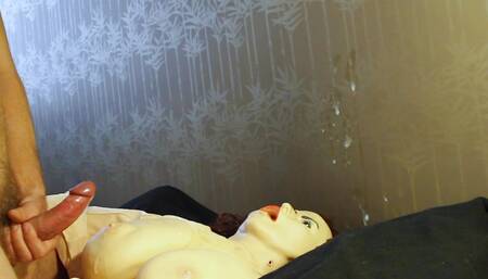 Huge Cumshot flying over the sexdoll hitting the wall instead!