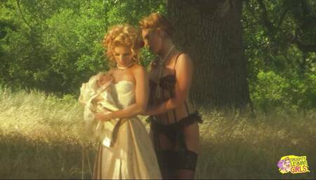 Blondes in the wild west in an open field get naked and have lesbian sex