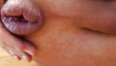 Playing with my stretched big ass lips and hiding them