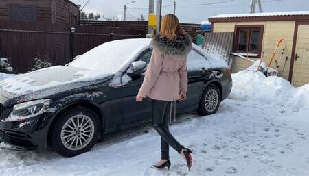 girl tries to start the car, but nothing works