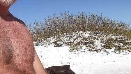 Rubbing my big cock on the beach until I blow my load