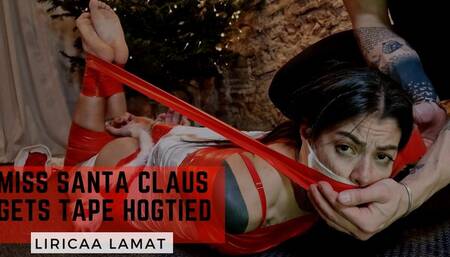 Miss Santa Claus gets tape hogtied