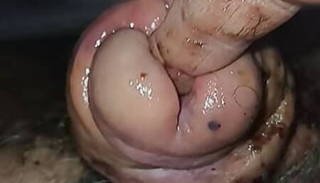Jerking off the cock head and shaft and finger fucking in the urethra that  has as split in half