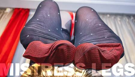 Foot tease in black nylons with white polka dots and red reinforced toes (4K MP4)