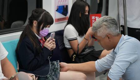 Asian girl is groped and teased while on the train