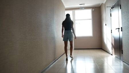 Girl walking on dirt, walking on pictures of a man, crushing