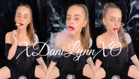 Smoking Marlboro in Black Dress