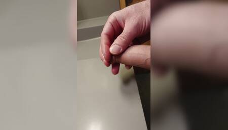 Wank and cum in college bathroom