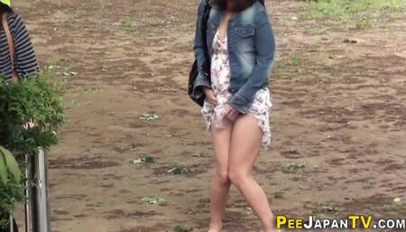 Cute asians urinating in public