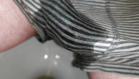 Pissing my pants while supper horny and with a boner