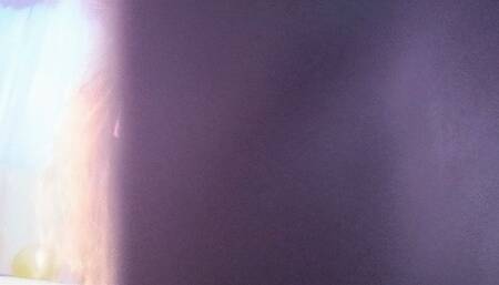 Game with very large purple non-pop balloon