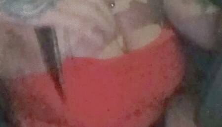 Crystal drives to party in sexy orange top with a stall