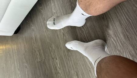 Sock Jock Removing Shoes After Long 8 Work Day