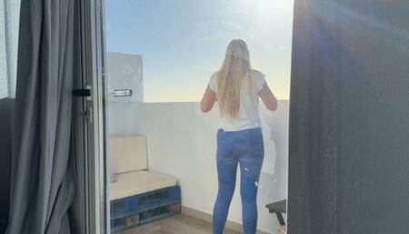 Girl stuck on balcony and has to pee in jeans