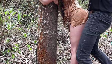 Forest girl tied to tree