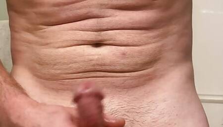 Male solo masturbation in the bathroom