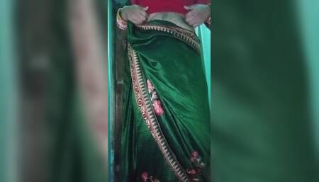 Indian Gay Crossdresser Gaurisissy in Green Saree Pressing Her Big Boobs and Fingering in Her Ass