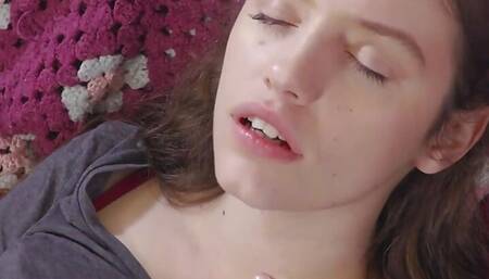 Big boobed chick in pantyhose masturbates on the sofa