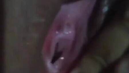 Masturbating