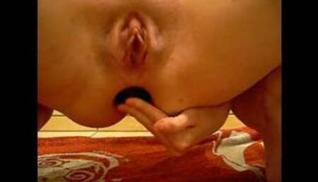 stuffing a big marble egg up my ass