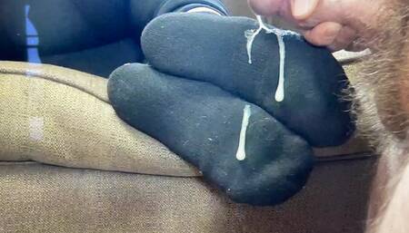 Cumming on her socks