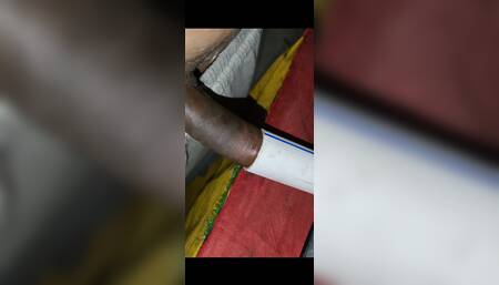 Indian boy at home having fun with conduit pipe and cumming inside it