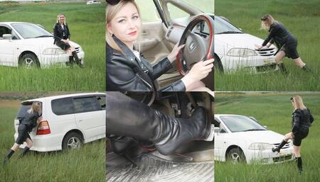 Russian long-legged beauty stuck on the car - pedal pumping