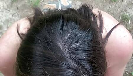 Nebraska coed sucks a stranger's cock on a public trail in the woods