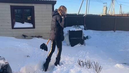 girl in ballet boots climbs a snowy mountain and falls off it many times