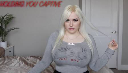 HOLDING YOU CAPTIVE