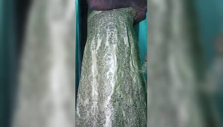 Indian gay Crossdresser Gaurisissy xxx sex in Golden Saree pressing his boobs and fingering his ass