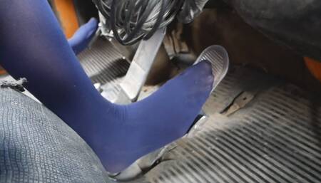 A very tall hottie in pantyhose drives an old powerful truck - pedal pumping