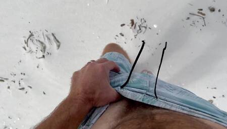 Sand, cock and cum