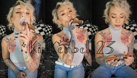 Smoking and inhaling cigar in Denim jeans and Silver top - Kinkerbell23
