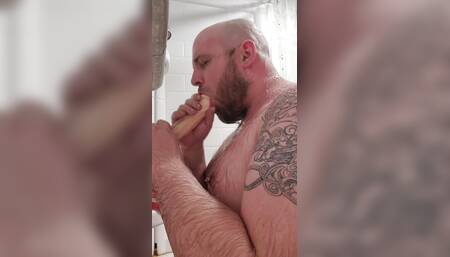 Sucking a huge cock