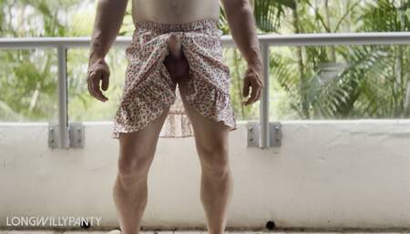 Randy straight guy wears skirt on hotel balcony