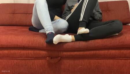 TWO GIRLS PLAYING SEXY FOOTSIE IN SOCKS BIG AND SMALL FEET - MOV HD